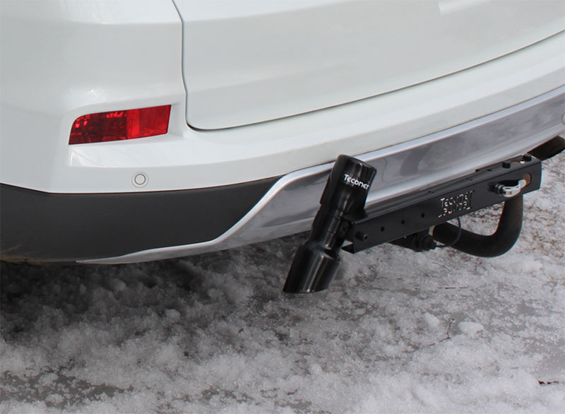 Salt Sense mobile road condition monitor mounted to a white vehicle in winter conditions